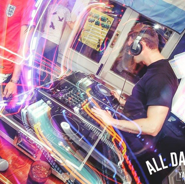 DJ Ultra mixing at a club event